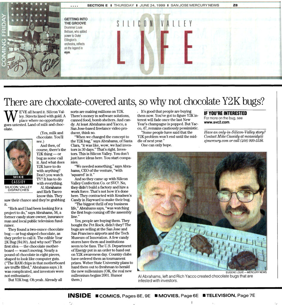 Mike Cassidy article including photo of author and second photo showing Abrahams and Yacco behind computer keyboard covered by two Year 2K Bug candies.